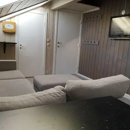 Деревянный коттедж Fossheim Lodge Apartments